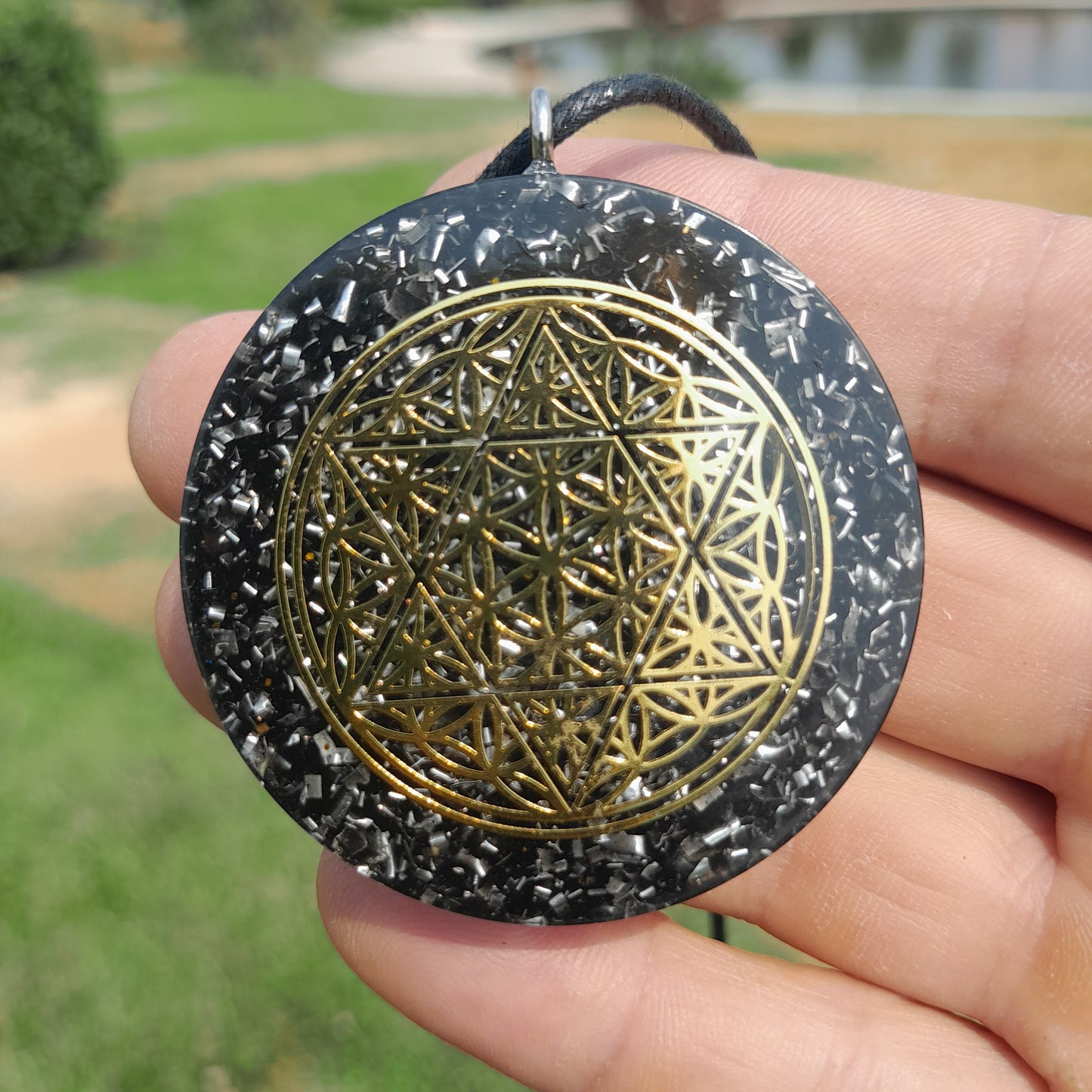 Colgante de Orgonita Flor de la Vida y Estrella de 6 Puntas con Shungita