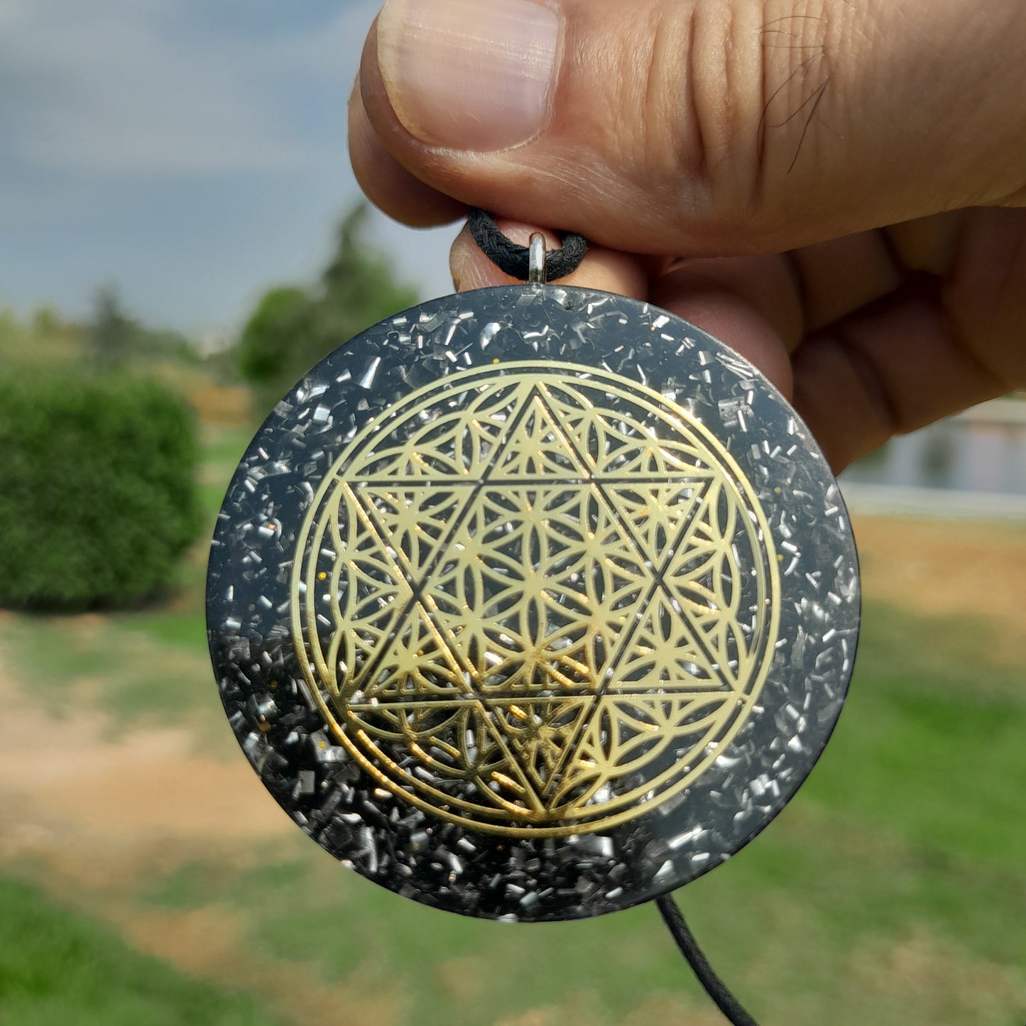 Colgante de Orgonita Flor de la Vida y Estrella de 6 Puntas con Shungita