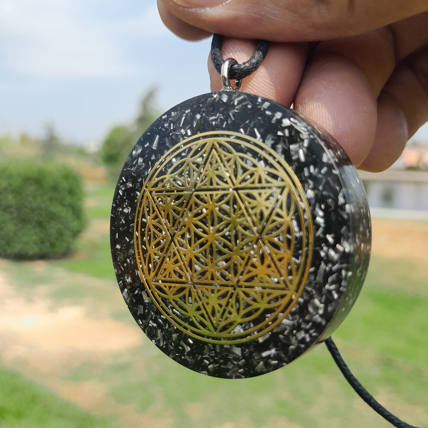 Colgante de Orgonita Flor de la Vida y Estrella de 6 Puntas con Shungita