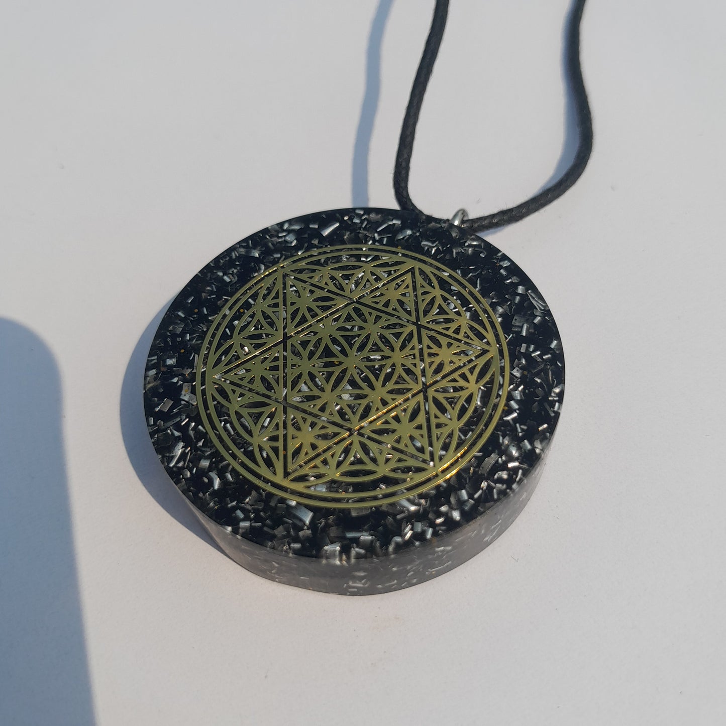 Colgante de Orgonita Flor de la Vida y Estrella de 6 Puntas con Shungita