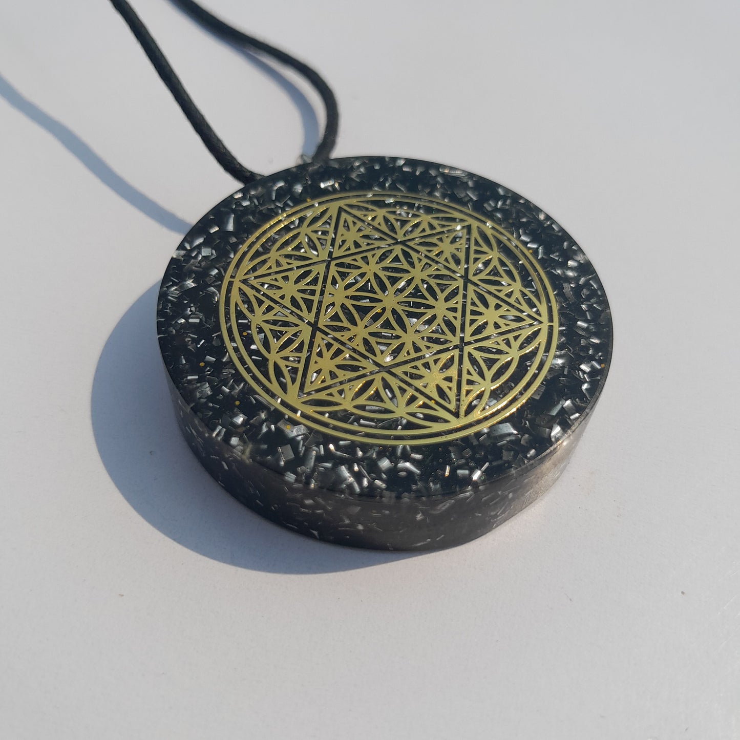 Colgante de Orgonita Flor de la Vida y Estrella de 6 Puntas con Shungita