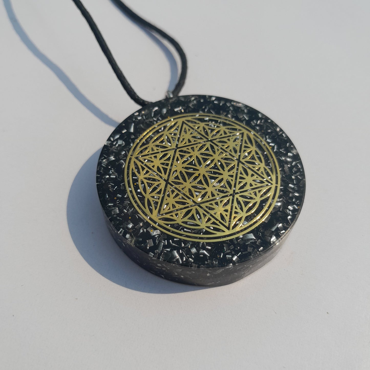 Colgante de Orgonita Flor de la Vida y Estrella de 6 Puntas con Shungita