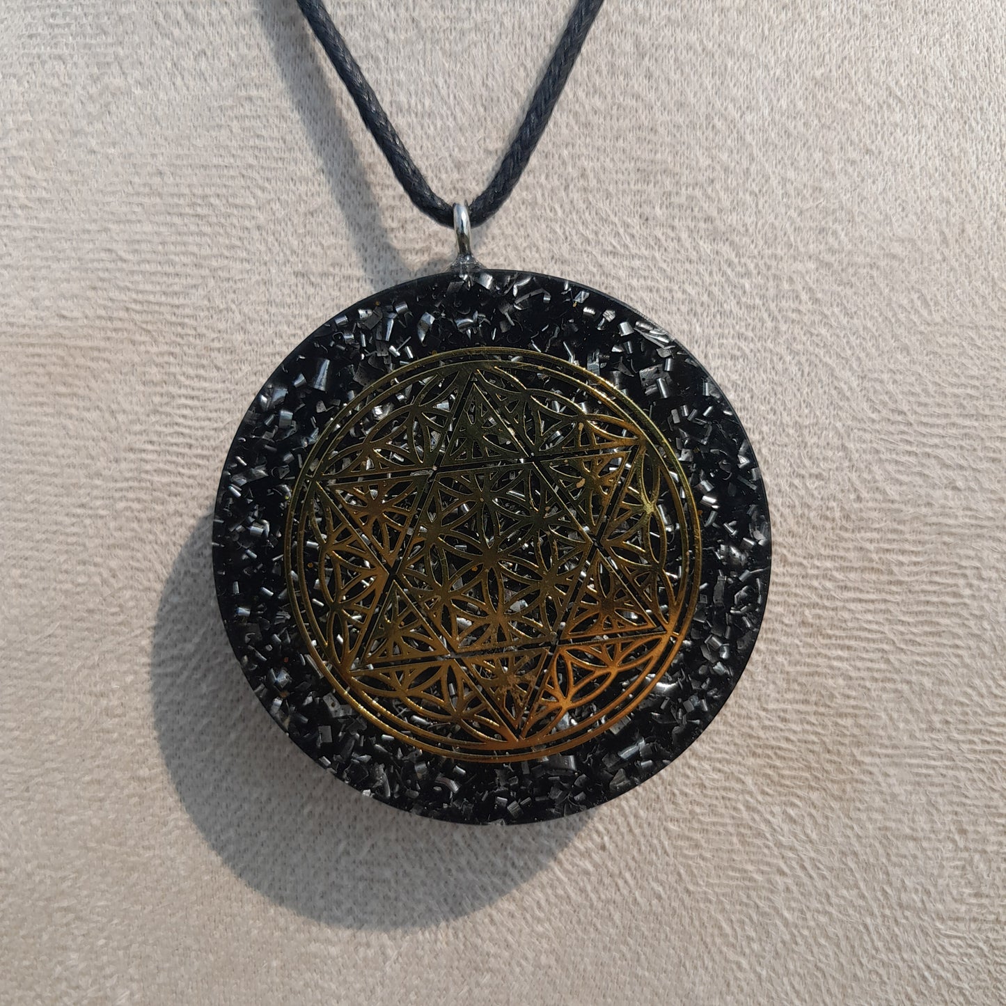 Colgante de Orgonita Flor de la Vida y Estrella de 6 Puntas con Shungita