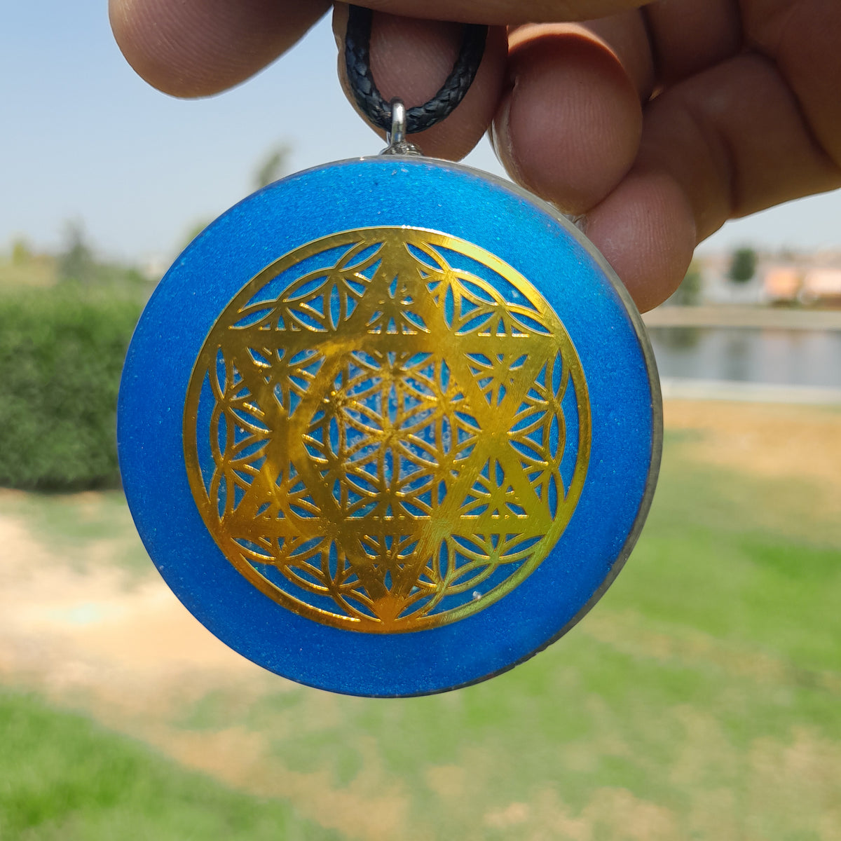Colgante de Orgonita Flor de la Vida y Estrella de 6 Puntas