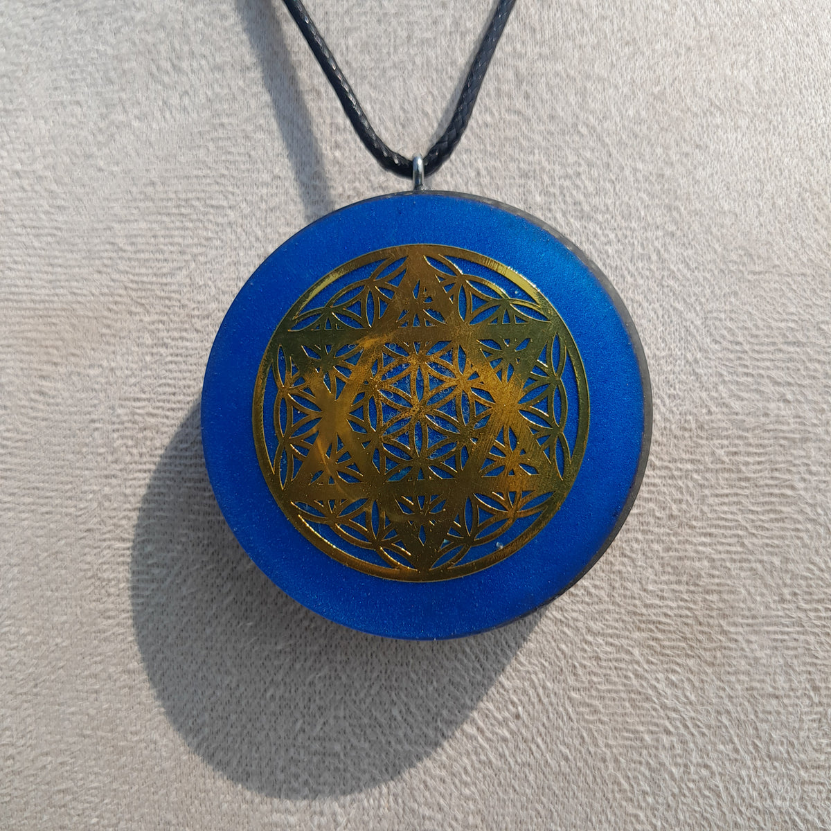 Colgante de Orgonita Flor de la Vida y Estrella de 6 Puntas