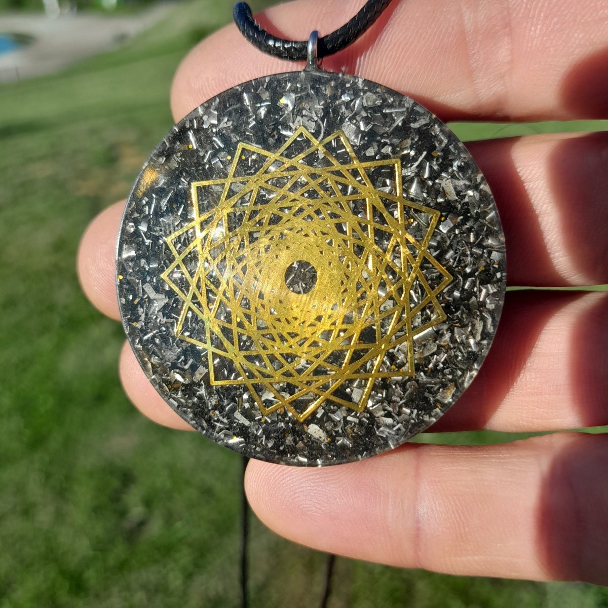 Colgante de Orgonita Estrella 16 Punta con Shungita - Mundo Orgon LTD