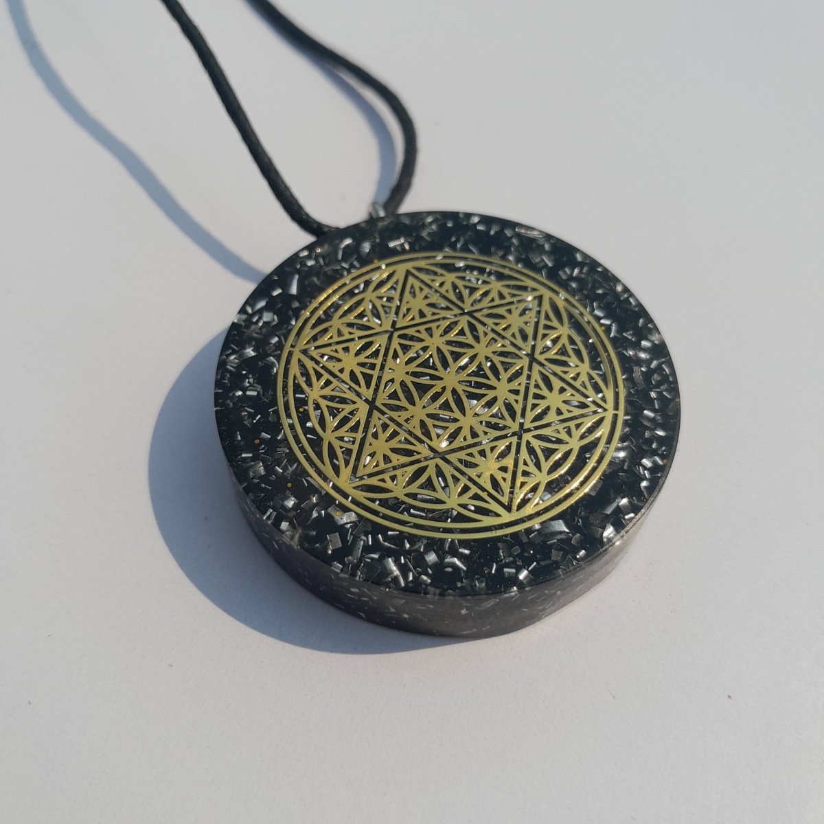 Colgante de Orgonita Flor de la Vida y Estrella de 6 Puntas con Shungita - Mundo Orgon LTD