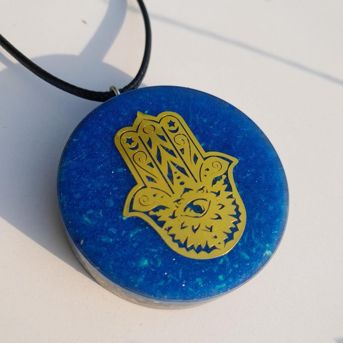 Colgante Orgonita Mano de Fátima con Shungita - Mundo Orgon