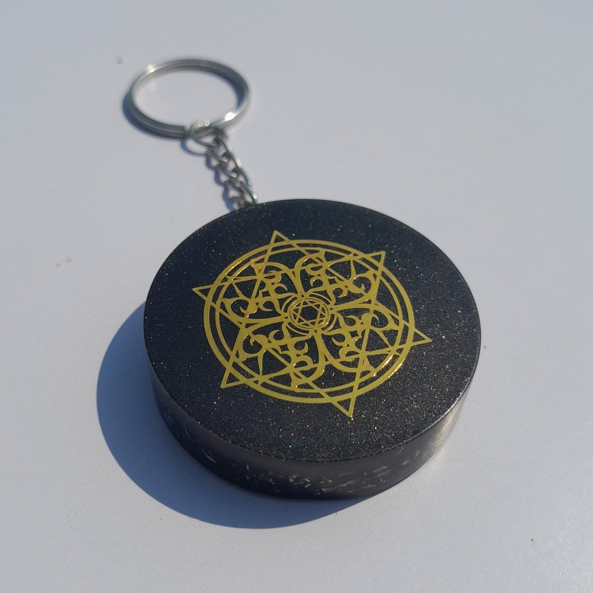 Llavero de Orgonita Estrella de 6 Puntas con Shungita - Mundo Orgon LTD