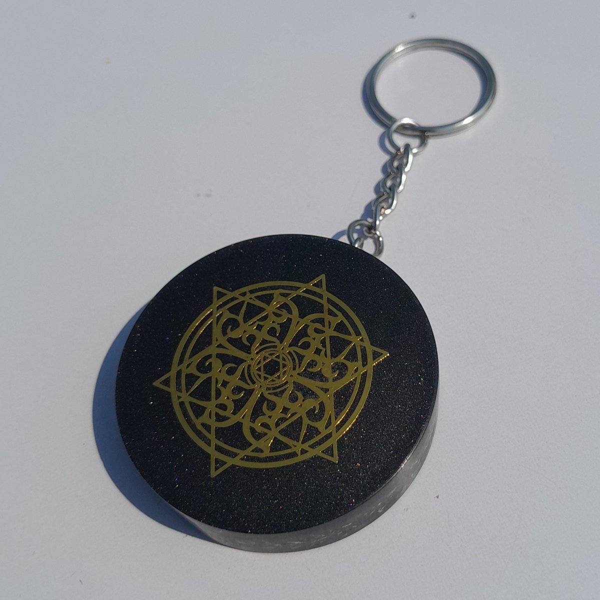 Llavero de Orgonita Estrella de 6 Puntas con Shungita - Mundo Orgon LTD