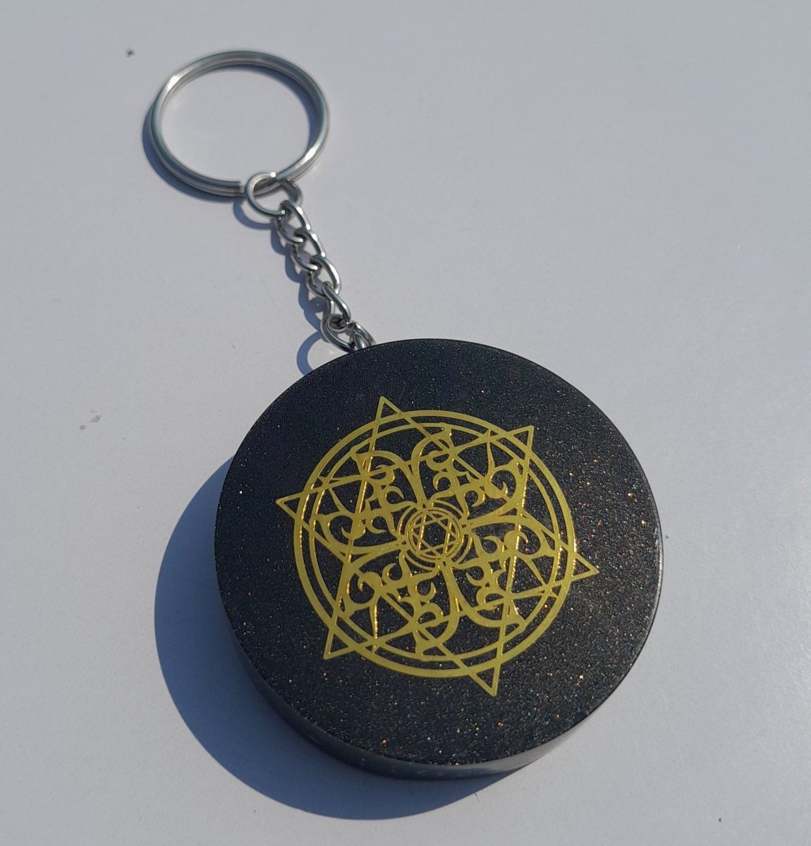 Llavero de Orgonita Estrella de 6 Puntas con Shungita - Mundo Orgon LTD