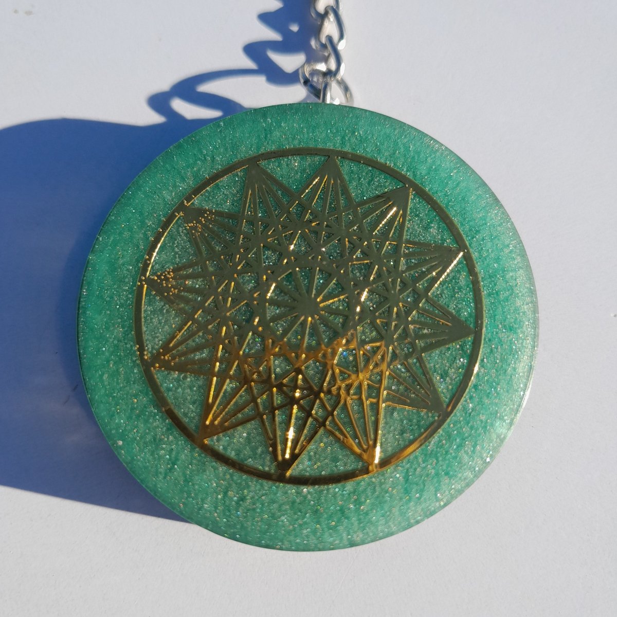 Llavero Orgonita Estrella de 12 Puntas Verde con Shungita - Mundo Orgon LTD