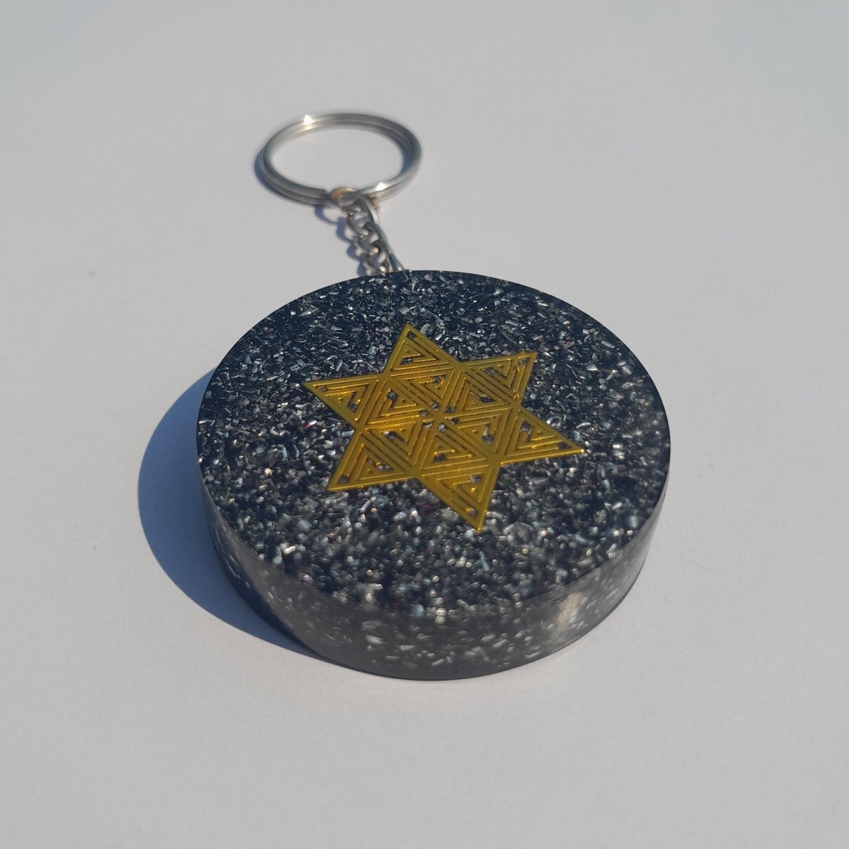 Llavero Orgonita Estrella de 6 Puntas con Shungita - Mundo Orgon