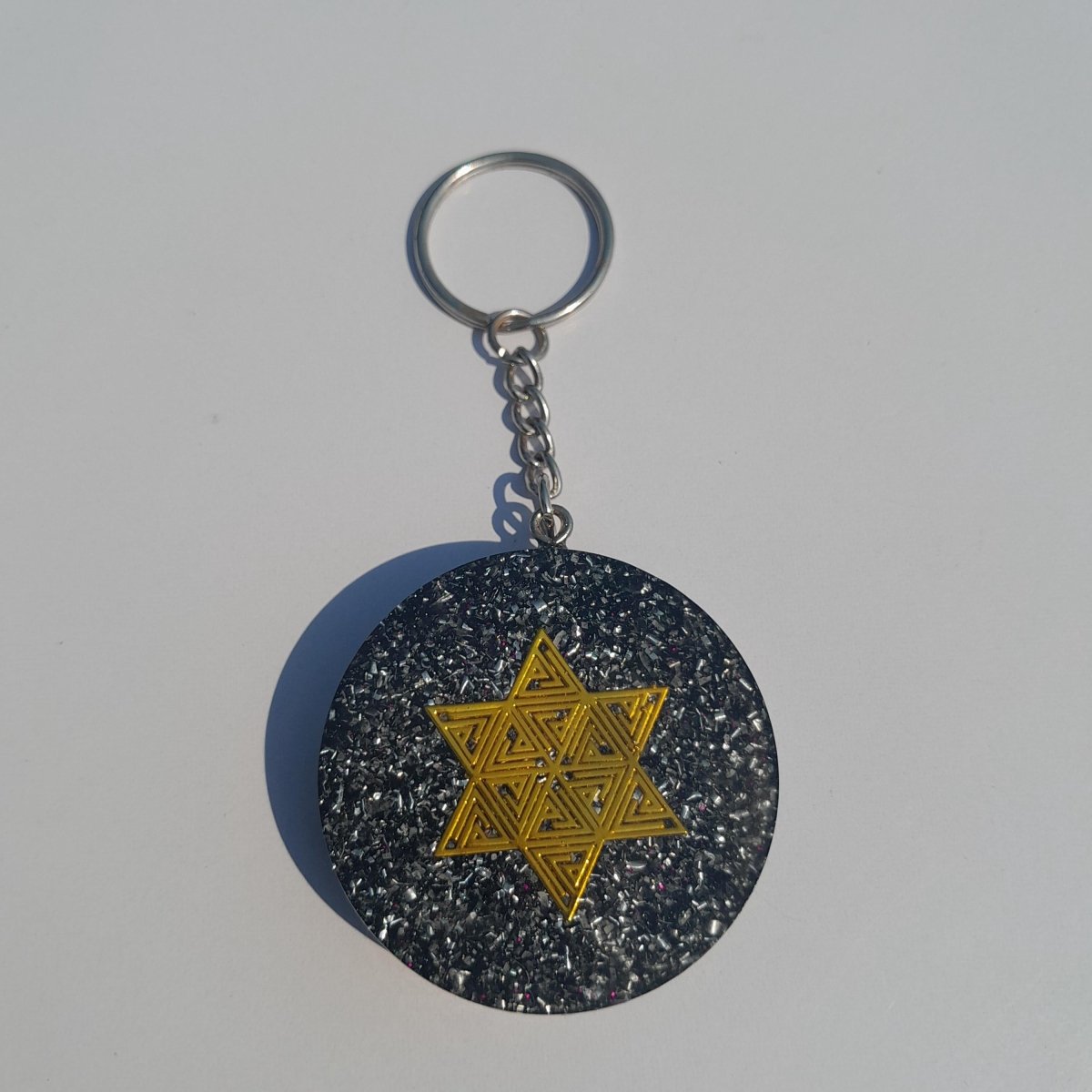 Llavero Orgonita Estrella de 6 Puntas con Shungita - Mundo Orgon
