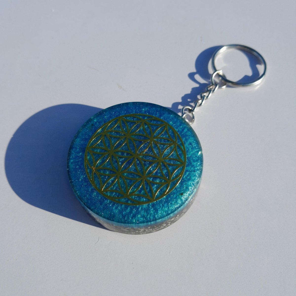 Llavero Orgonita Flor de la Vida Azul Cielo con Shungita - Mundo Orgon
