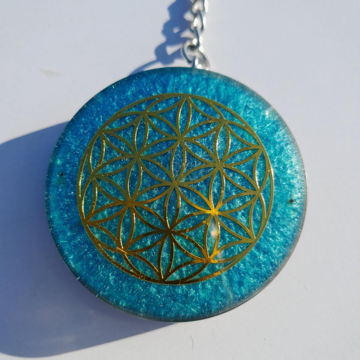 Llavero Orgonita Flor de la Vida Azul Cielo con Shungita - Mundo Orgon