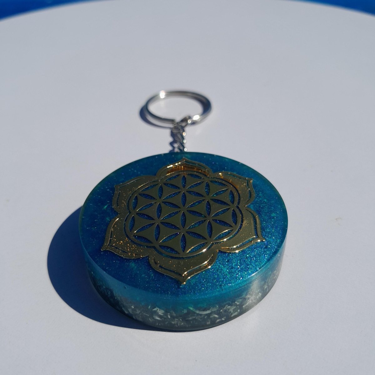 Llavero Orgonita Flor de la Vida con Flor de Loto Azul con Shunguita - Mundo Orgon