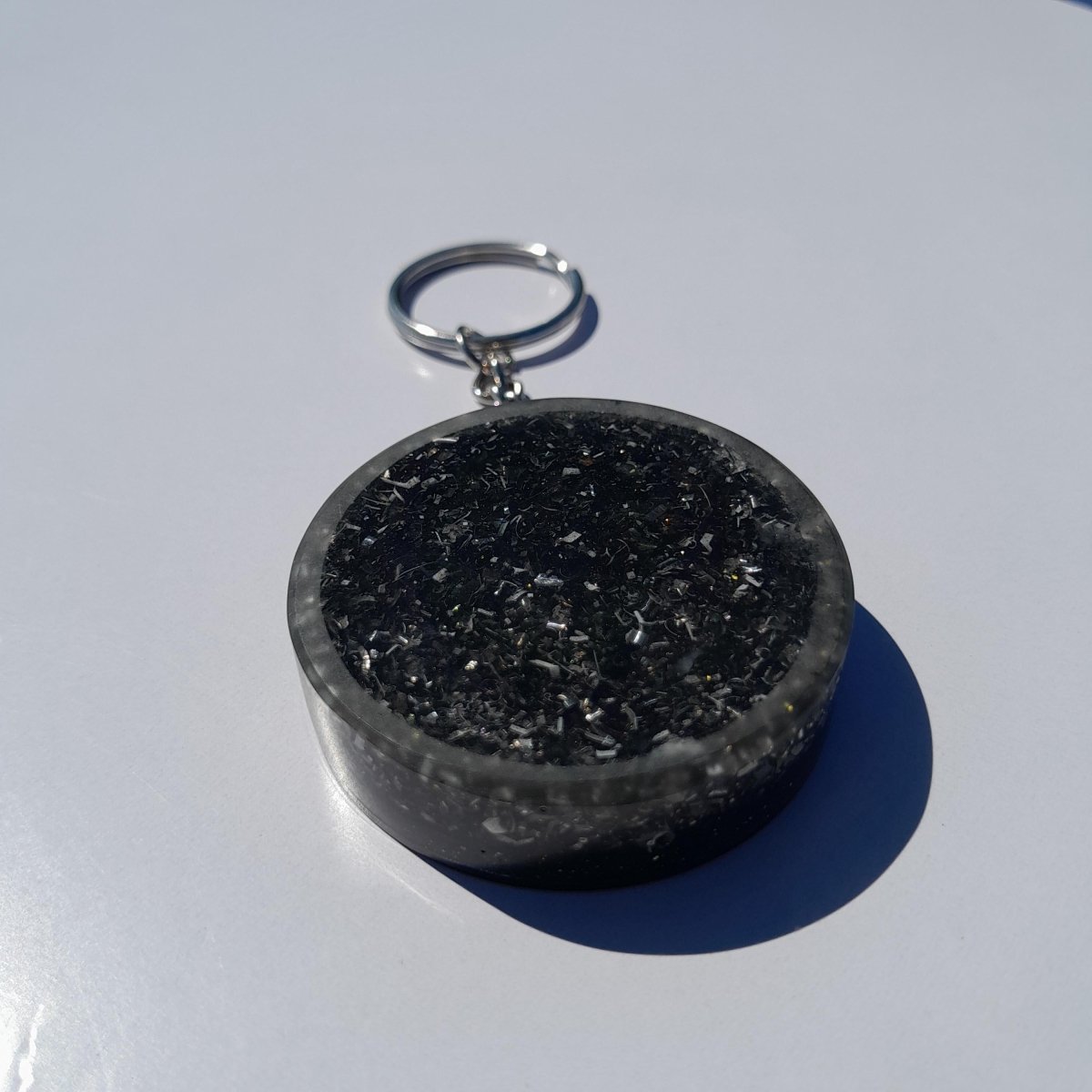 Llavero Orgonita Flor de la Vida con Shunguita en Polvo - Mundo Orgon