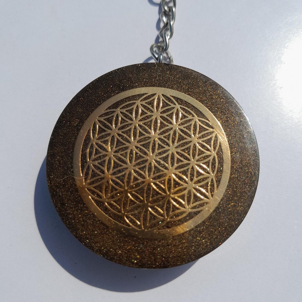 Llavero Orgonita Flor de la Vida Marrón con Shunguita - Mundo Orgon