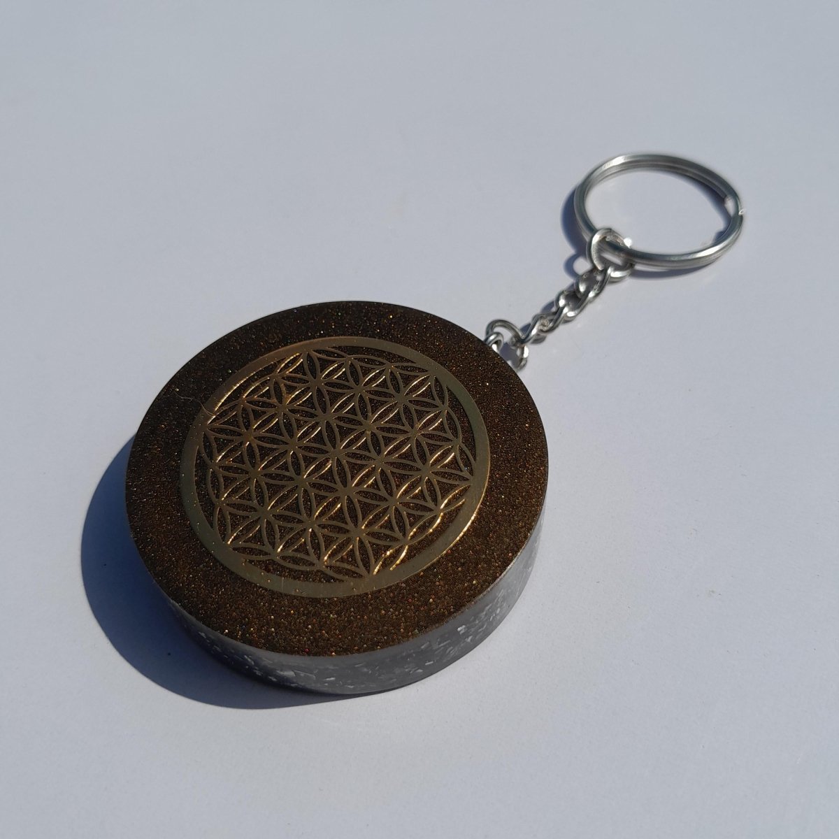 Llavero Orgonita Flor de la Vida Marrón con Shunguita - Mundo Orgon