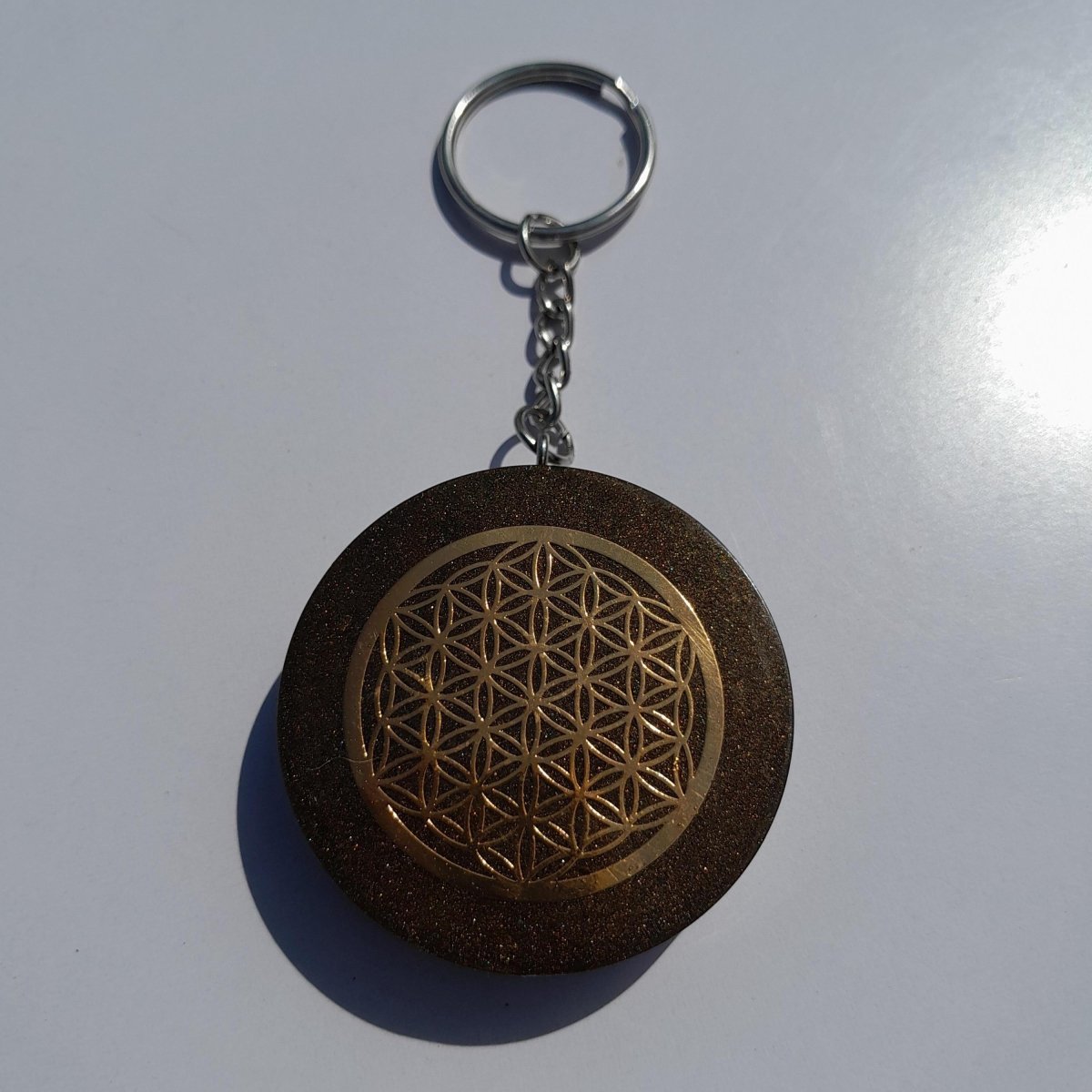 Llavero Orgonita Flor de la Vida Marrón con Shunguita - Mundo Orgon