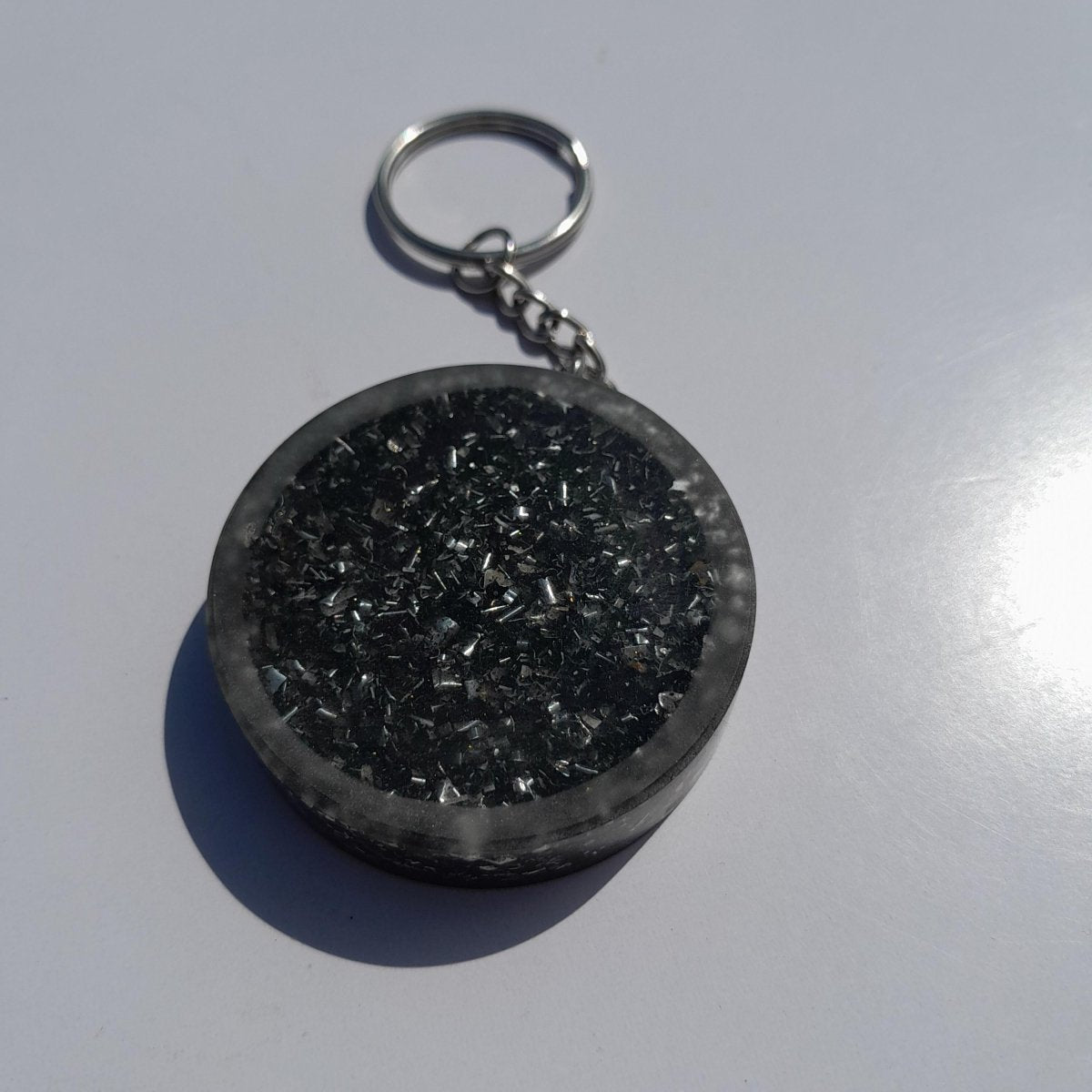 Llavero Orgonita Flor de la Vida Marrón con Shunguita - Mundo Orgon