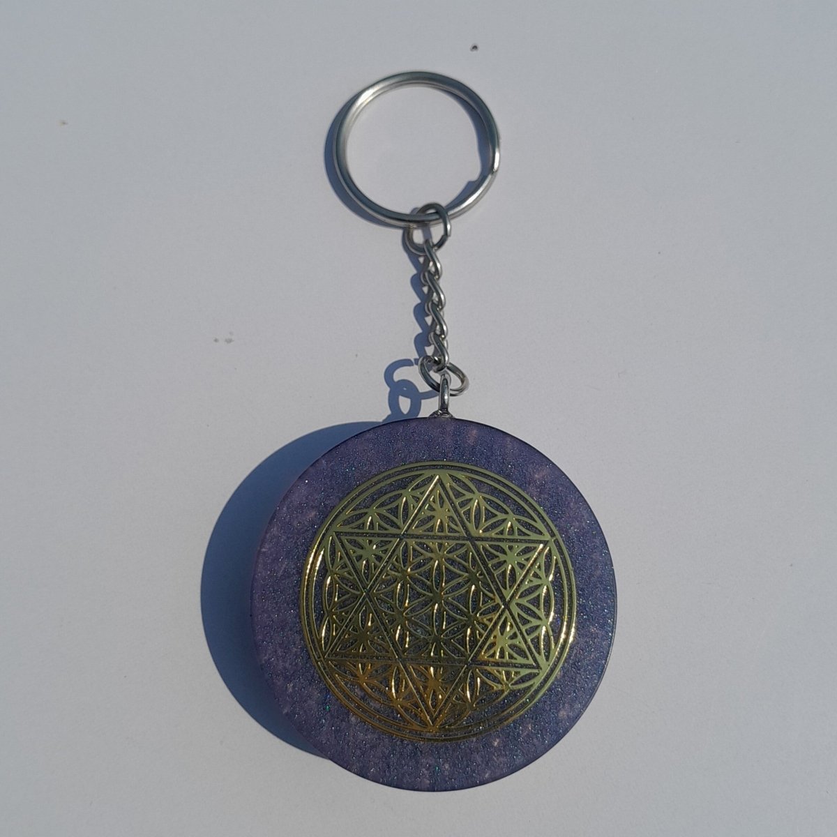 Llavero Orgonita Flor de la Vida y Estrella de 6 Puntas Violeta con Shungita - Mundo Orgon LTD
