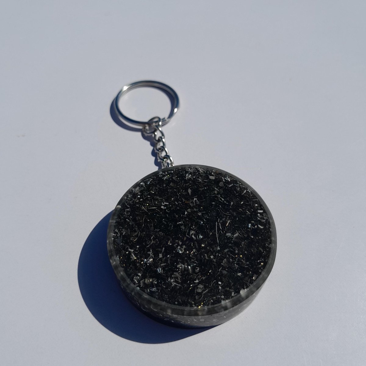 Llavero Orgonita Flor de Loto con Shunguita - Mundo Orgon